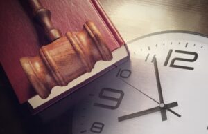 Clock, Gavel and Book. Concept of legal timeline